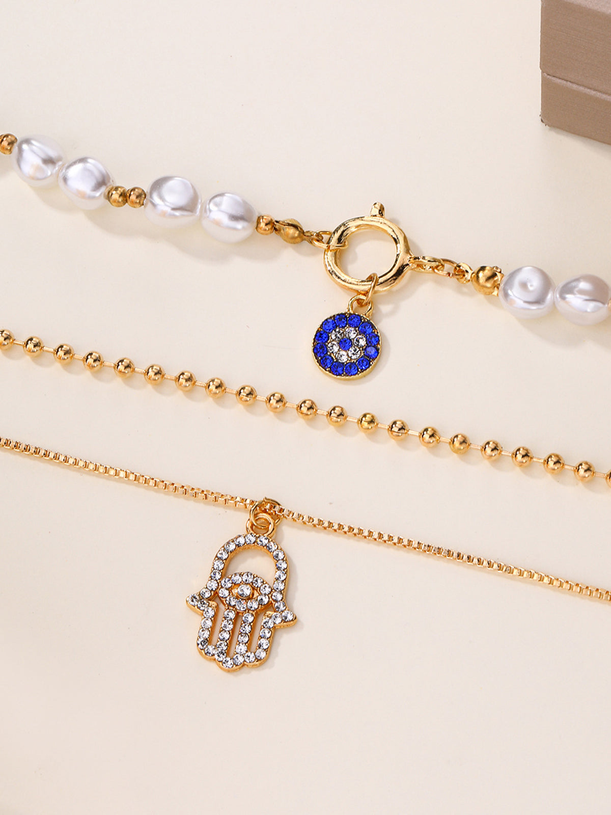 İnci ve Hamsa Eli Çok Katmanlı Kolye Seti