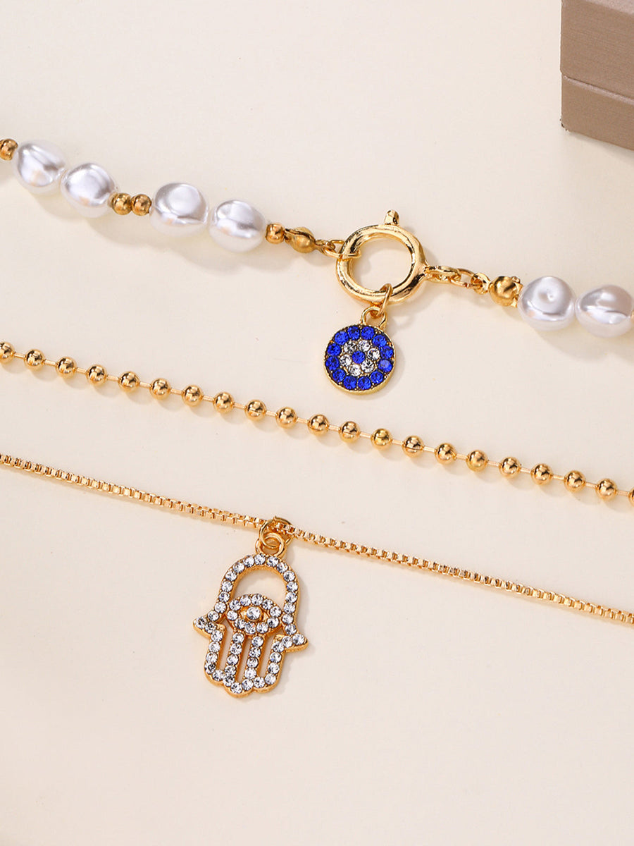 İnci ve Hamsa Eli Çok Katmanlı Kolye Seti